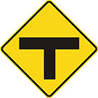 yellow diamond-shaped sign with black T shape