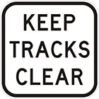 white sign with black text, keep tracks clear