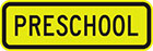 yellow sign with black text, preschool