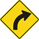 yellow diamond-shaped sign with black arrow that curves steadily to the right