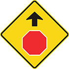 yellow diamond-shaped sign with black arrow and red octagon