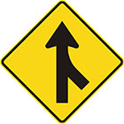 yellow diamond-shaped sign with black arrow pointing upward with a brach joining the tail from the bottom-right