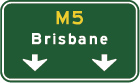 green sign with yellow M5 and white arrows pointing down at the bottom and the word Brisbane