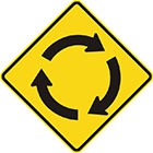 yellow diamond-shaped sign with three black arrows creating a circle, pointing in a clockwise direction