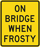 yellow sign with black text, on bridge when frosty