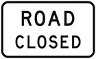 white sign with black text, road closed