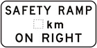 white sign with black text, safety ramp, space for distance, on right