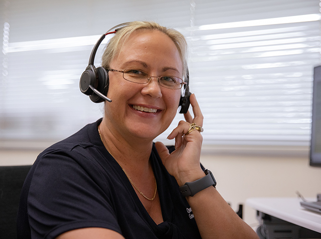 Woman on a telephone providing assistance