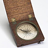 Boxed compass used to indicate the direction of an object relative to the magnetic pole