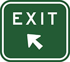 green sign with white arrow and the word exit