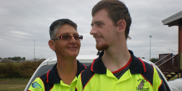 Michelle Boles with her son, Ryan, in his work uniform.