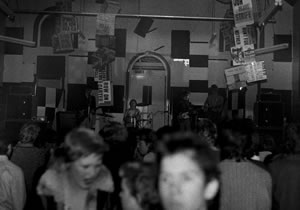 Photo of bands and the crowd inside Baroona Hall from 4 July 1980