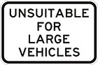 white sign with black text, unsuitable for large vehicles