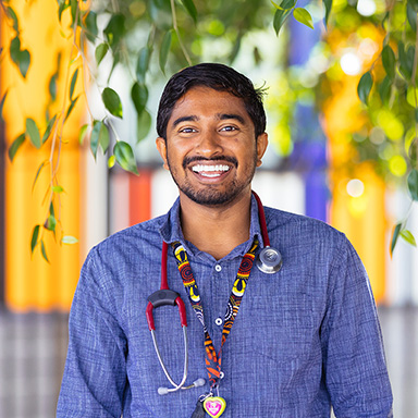 A pharmacist smiling