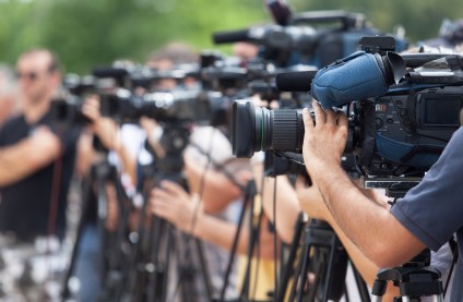 A group of people all holding video cameras