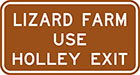 brown sign with white text, lizard farm use Holley exit