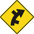 yellow diamond-shaped sign with black arrow that curves steadily right with alternate lines branching off on both sides of the curve