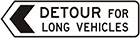 white sign with black arrow and text, detour for long vehicles