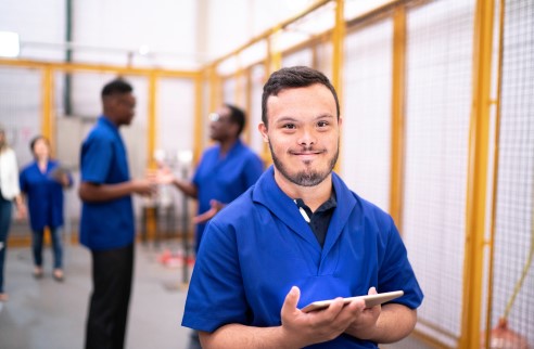 a young man in a work environment