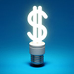 A light bulb shaped into a dollar sign on a blue background