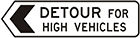 white sign with black arrow and text, detour for high vehicles