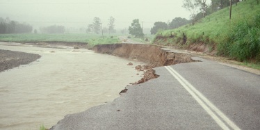 Erosion causing serious damage to a road